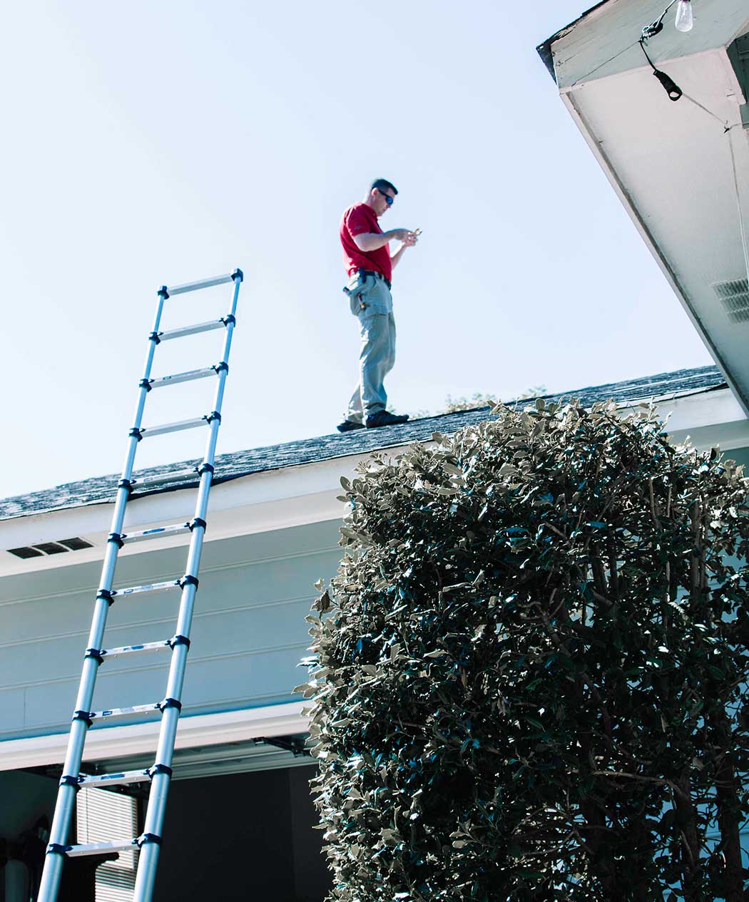 How to prepare for a home inspection - home inspector checking the roof.